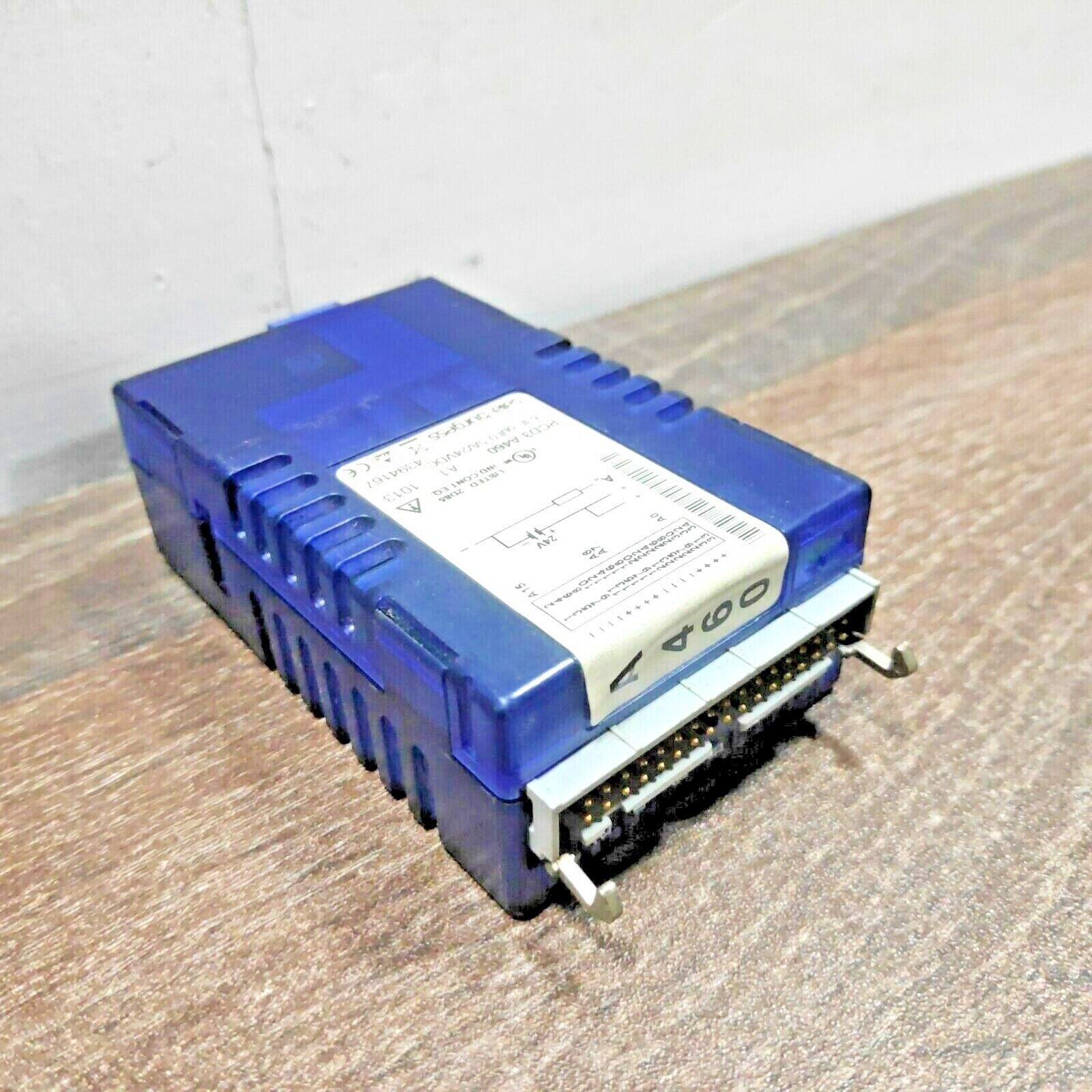 SAIA BURGESS PCD3.A460 DIGITAL OUTPUT MODULE 16 OUTPUT / TRANSISTOR 34 POLE RIBBON CABLE CONNECTOR 0.5 AMP 10-32 VDC FOR USE WITH PLUG-IN SYSTEM CABLE